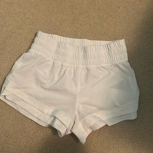Calia by Carrie Underwood, white shorts size small.